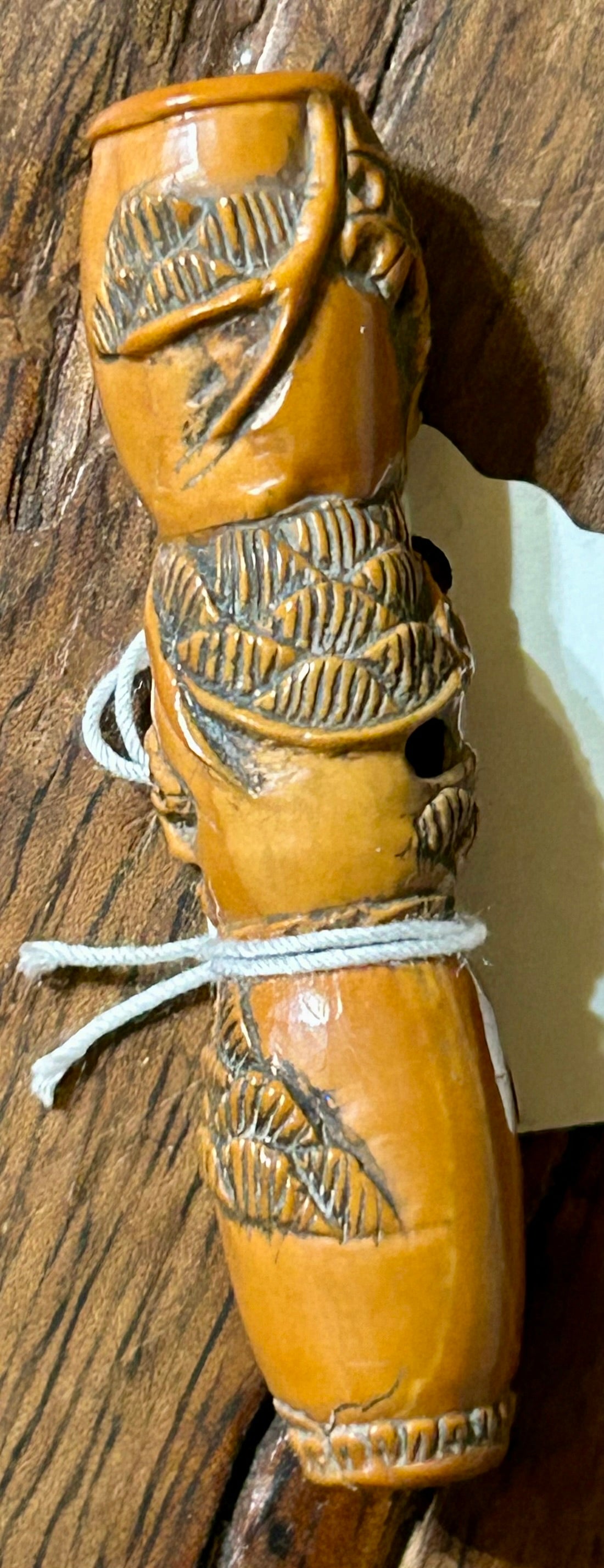 JAPANESE TOGUA NUT NETSUKE WITH CARVED SQUIRREL