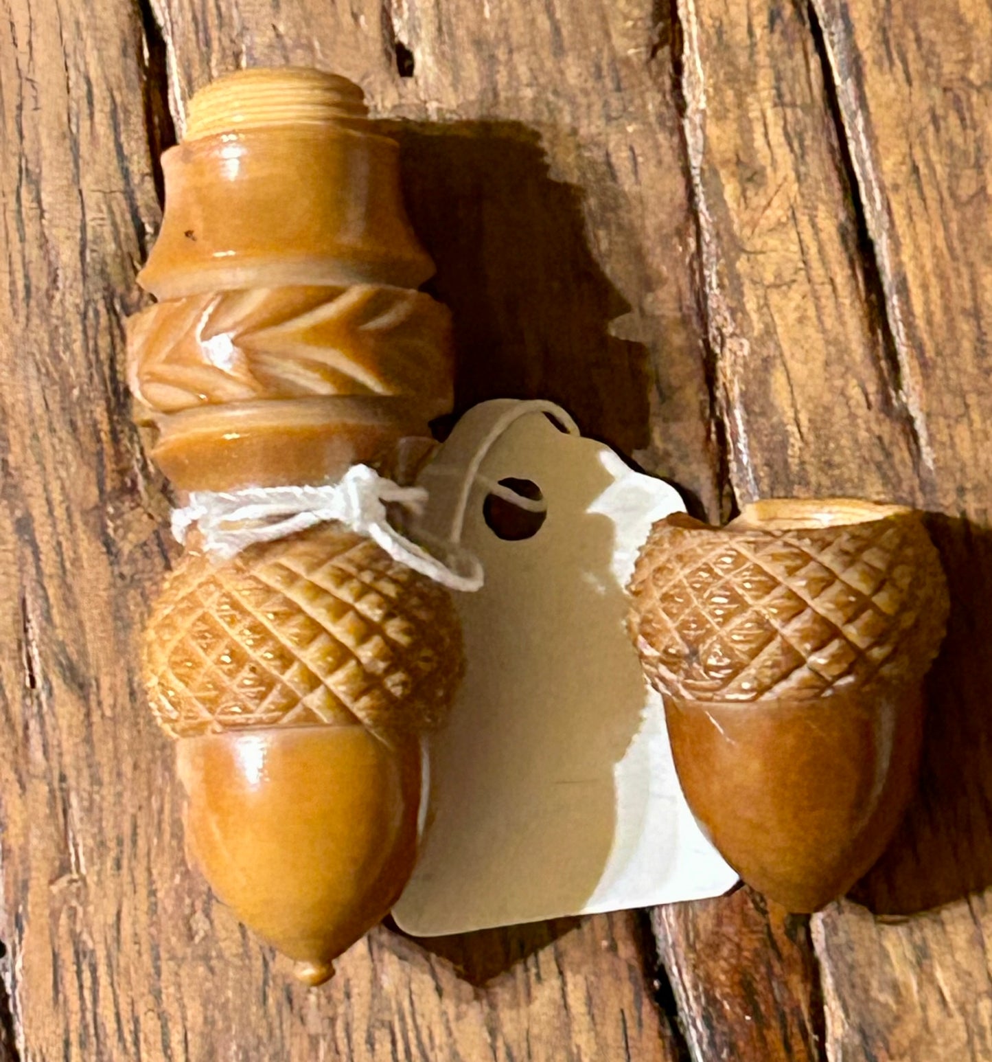 JAPANESE TOGUA NUT NETSUKE WITH CARVED SQUIRREL