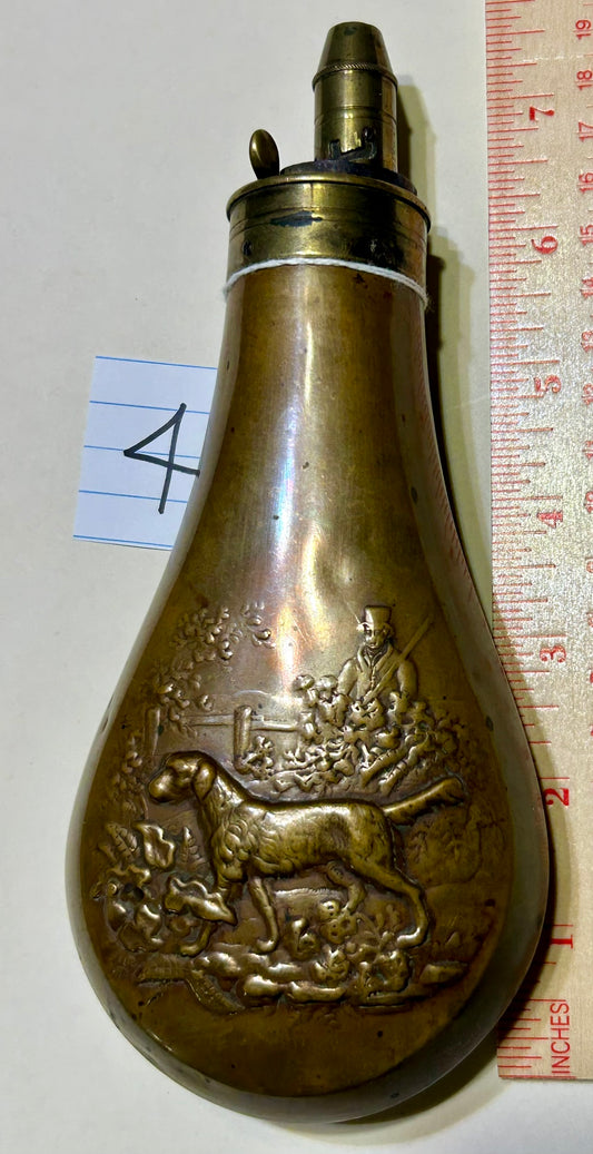 ANTIQUE DOG AND HUNTER POWDER FLASK