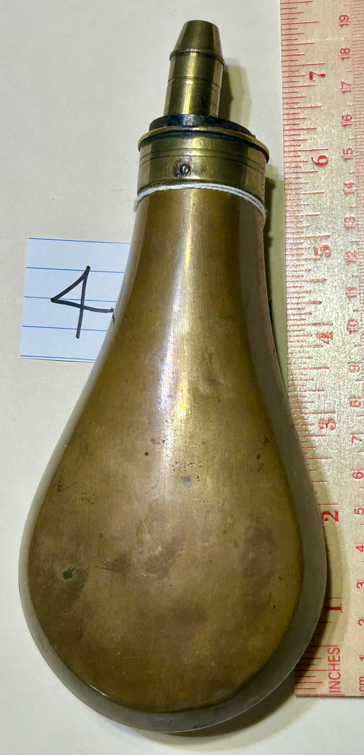 ANTIQUE DOG AND HUNTER POWDER FLASK