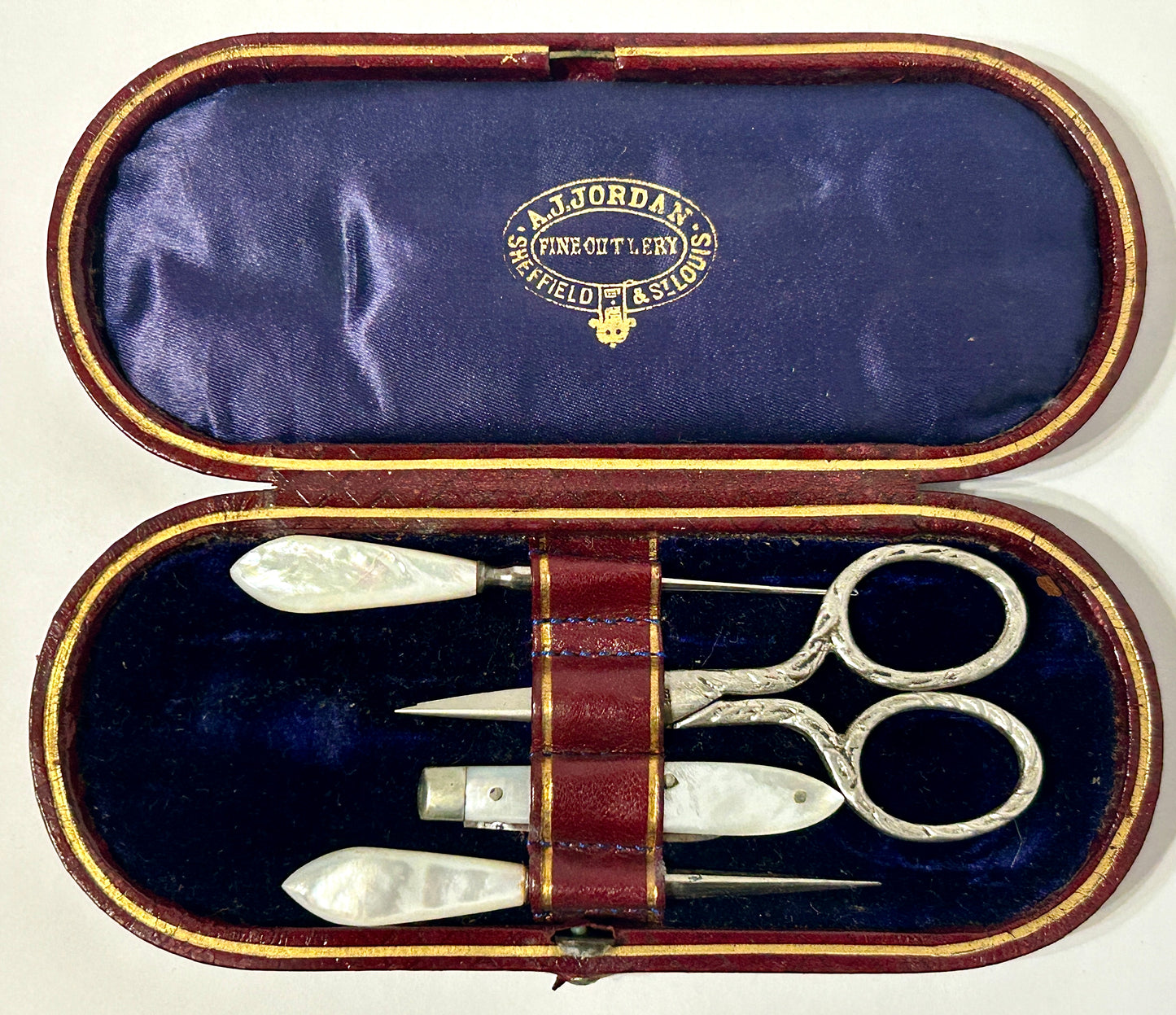ANTIQUE MANICURE SET WITH MOTHER OF PEARL HANDLES