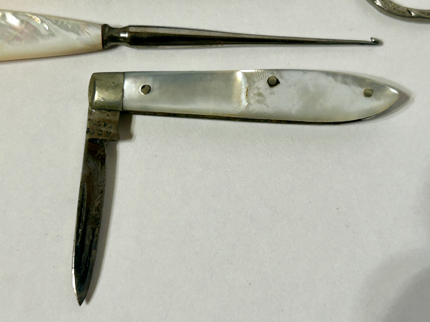 ANTIQUE MANICURE SET WITH MOTHER OF PEARL HANDLES