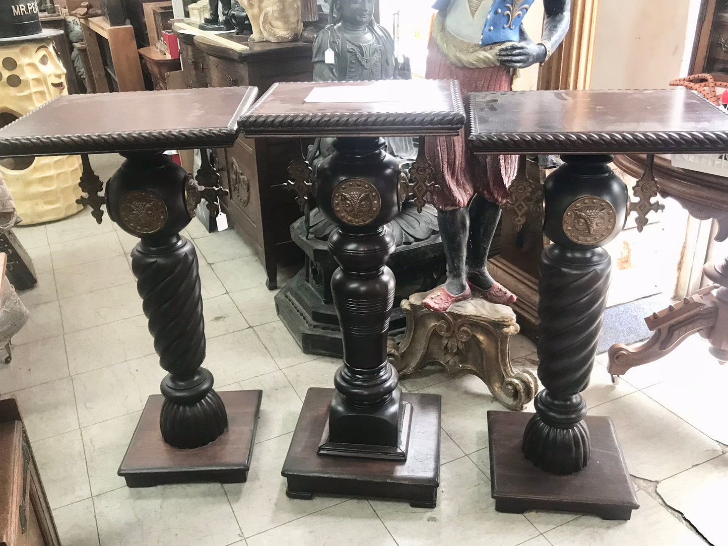 ANTIQUE MAHOGANY SET OF THREE PEDESTALS WITH OWL HEADS