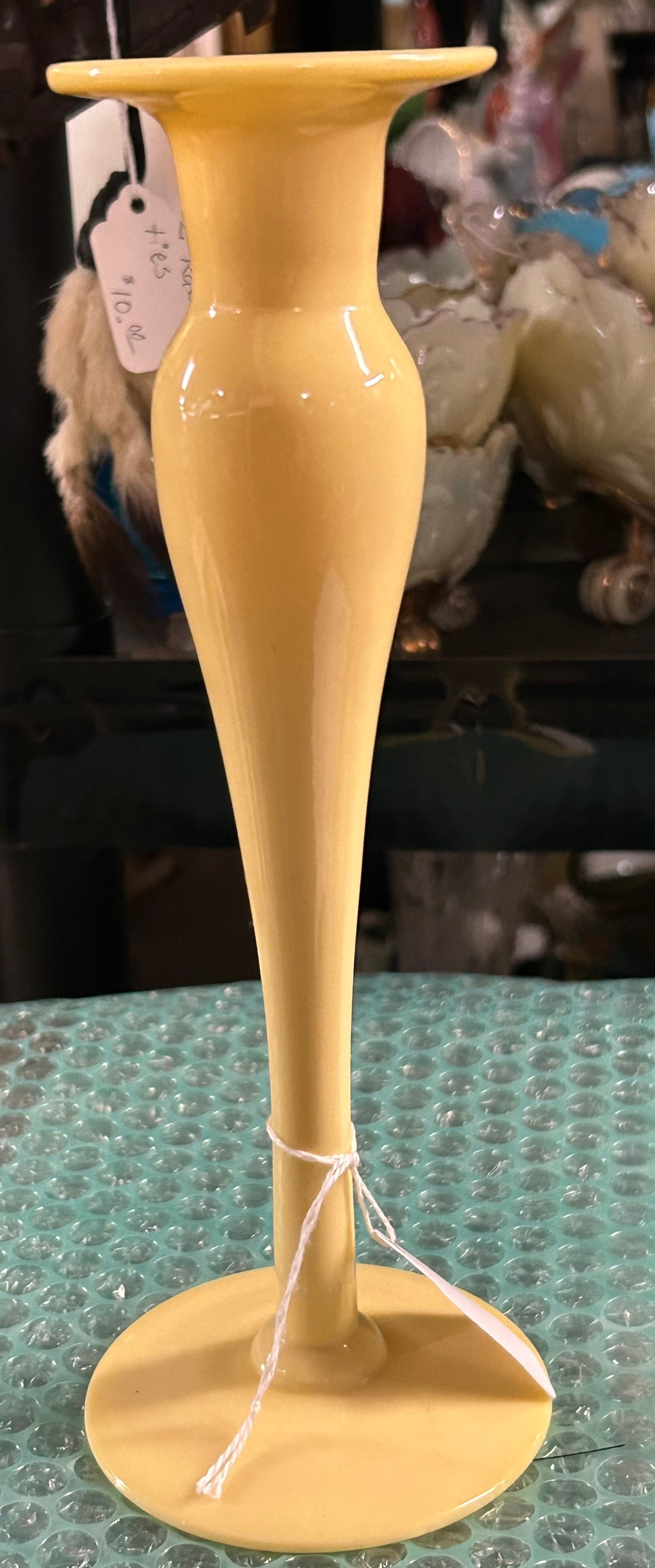 STEUBEN IVORY GLASS FOOTED BUD VASE