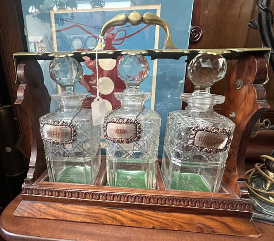 LIQUOR THREE DECANTER ANTIQUE LOCKING TANTALUS OR CADDY