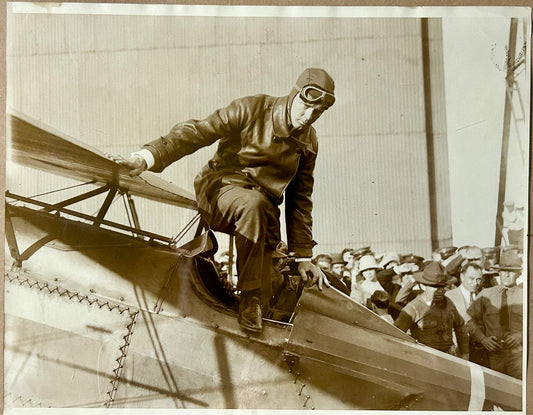 CHARLES LINDBERGH PHOTO GETTING OUT OF COCKPIT OF ARMY PURSUIT PLANE WITH CROWD PHOTO