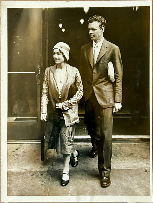 CHARLES LINDBERGH AND HIS WIFE NEWS PHOTOGRAPH OF THEM TWO MONTHS AFTER THE BIRTH OF THEIR SON