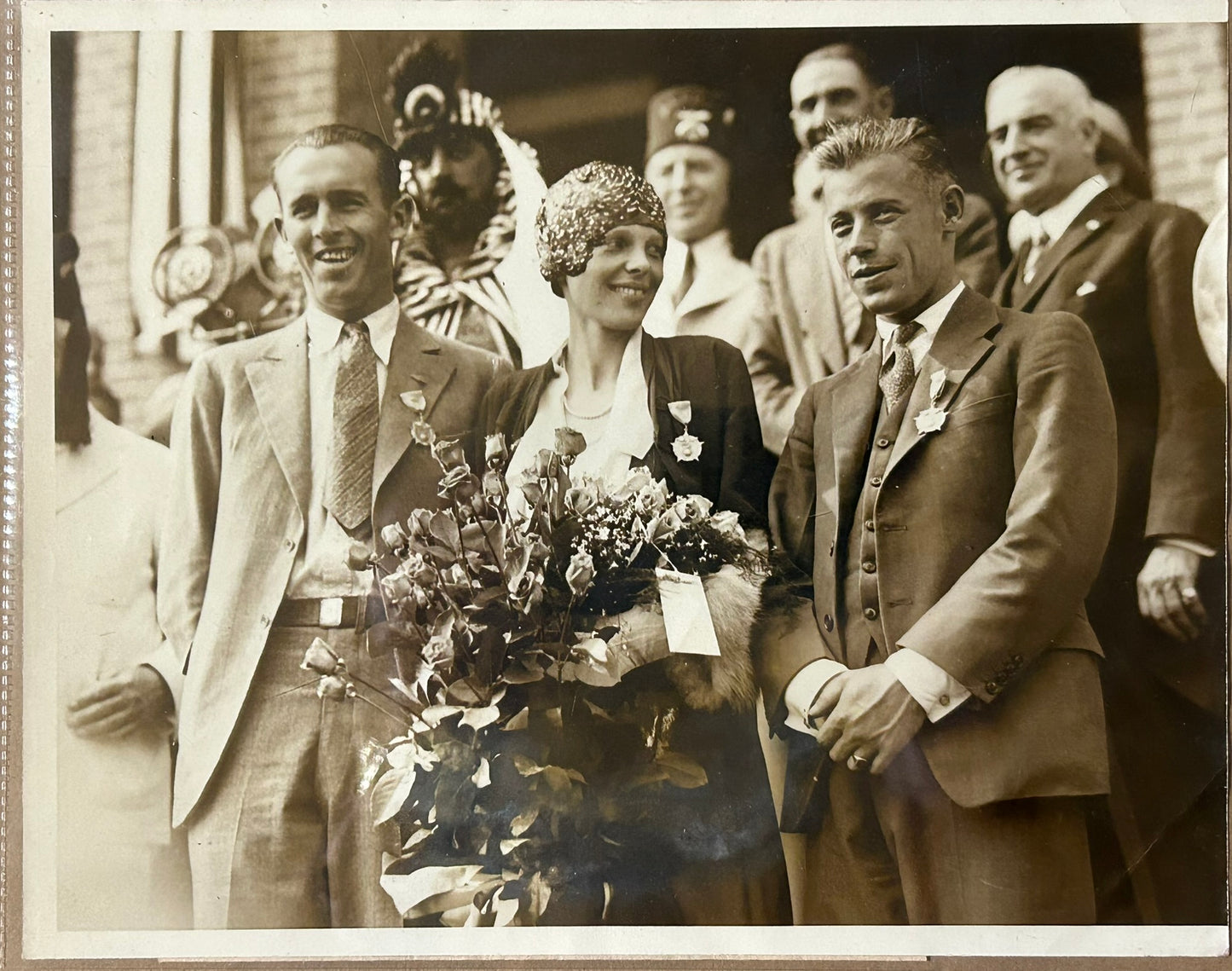 AMELIA EARHART, LOU GORDON, AND WILMER STULTZ AVIATORS IN NEWS SERVICE PHOTOGRAPH