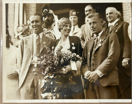 AMELIA EARHART, LOU GORDON, AND WILMER STULTZ AVIATORS IN NEWS SERVICE PHOTOGRAPH