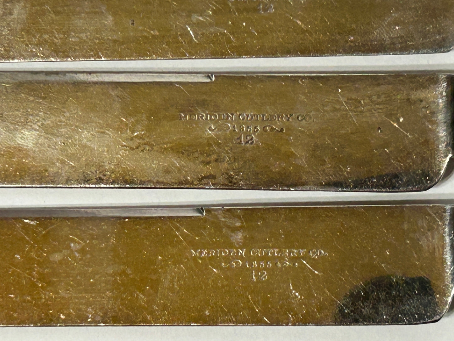 ANTIQUE STERLING AND MOTHER OF PEARL HANDLED SET OF KNIVES