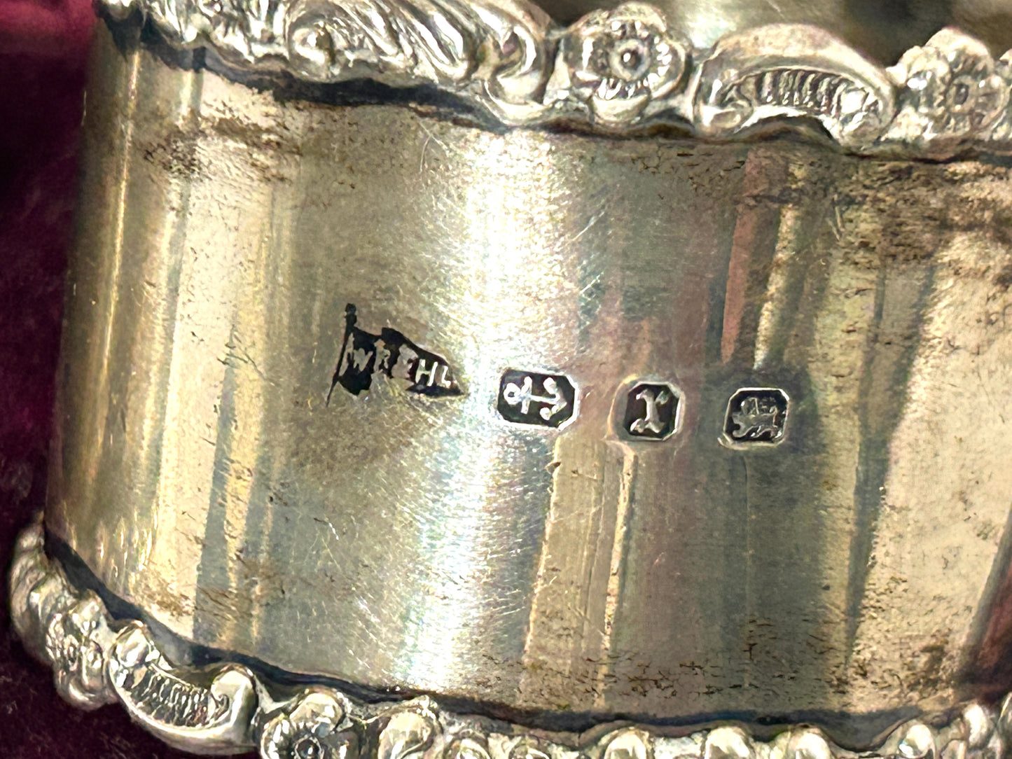 WALKER AND HALL PAIR OF ANTIQUE SILVER NAPKIN RINGS