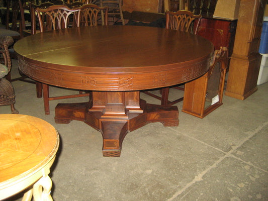 ANTIQUE LARGE ROUND MAHOGANY DINING TABLE WITH SIX LARGE LEAVES AND EIGHT CHAIRS