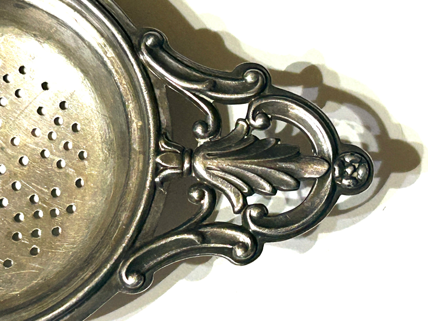 STERLING TEA STRAINER ANTIQUE