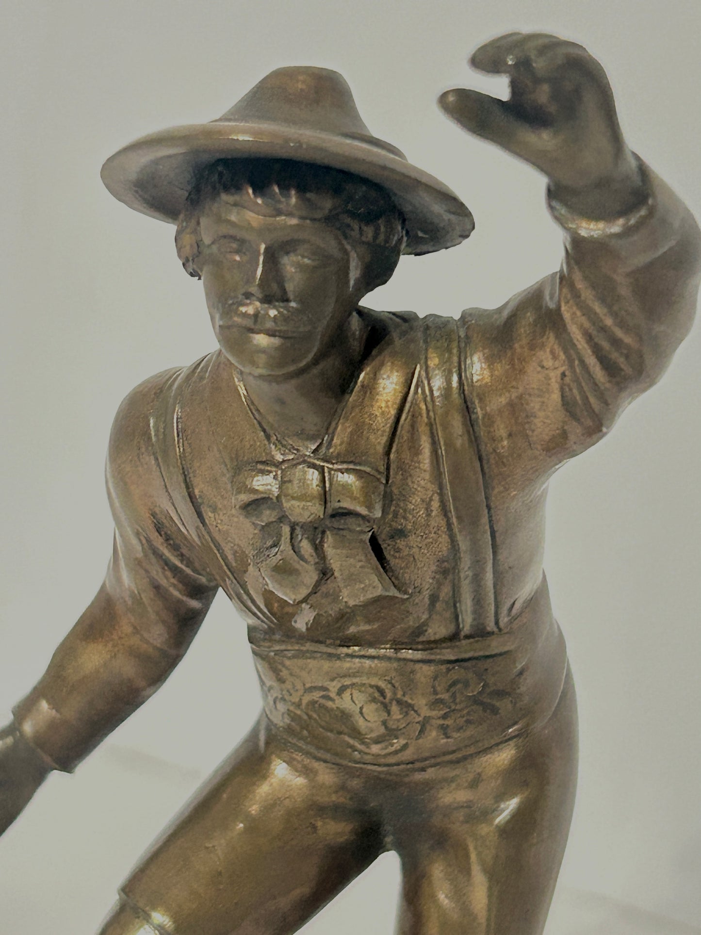 ANTIQUE BRONZE FIGURAL BELL OF DANCING MAN