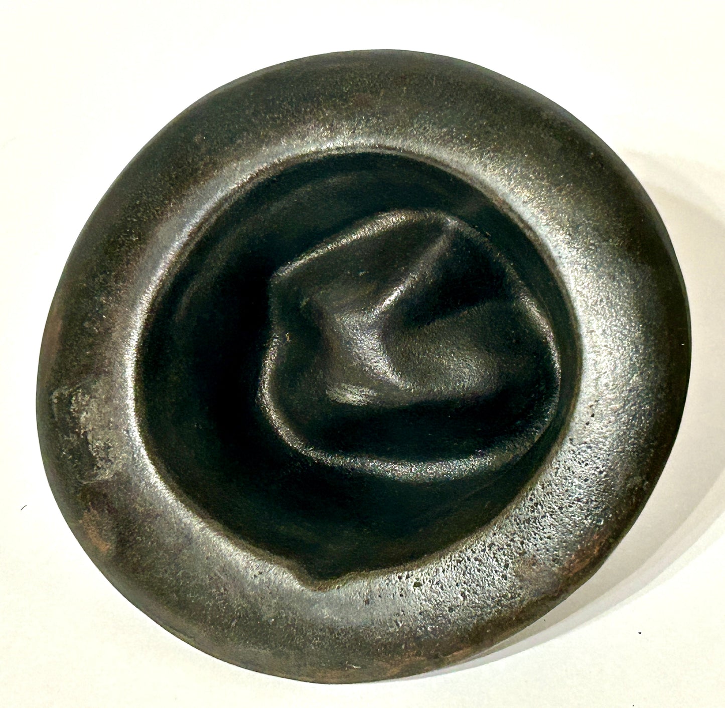 ANTIQUE CAST IRON HAT WITH SMASHED LOOK TOP