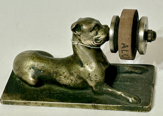 ANTIQUE CAST IRON FIGURAL DOG WITH SHARPENING DISC