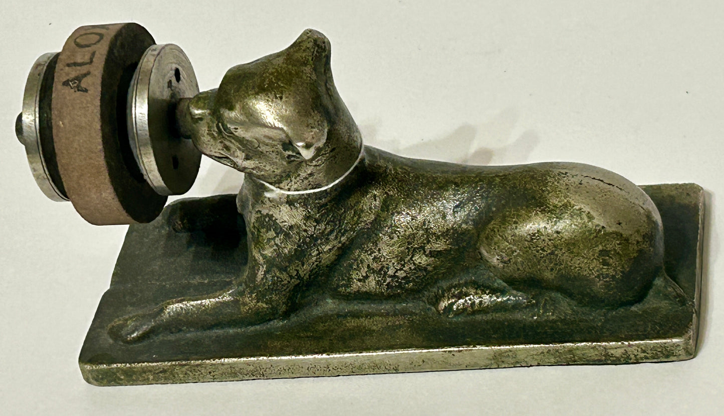 ANTIQUE CAST IRON FIGURAL DOG WITH SHARPENING DISC