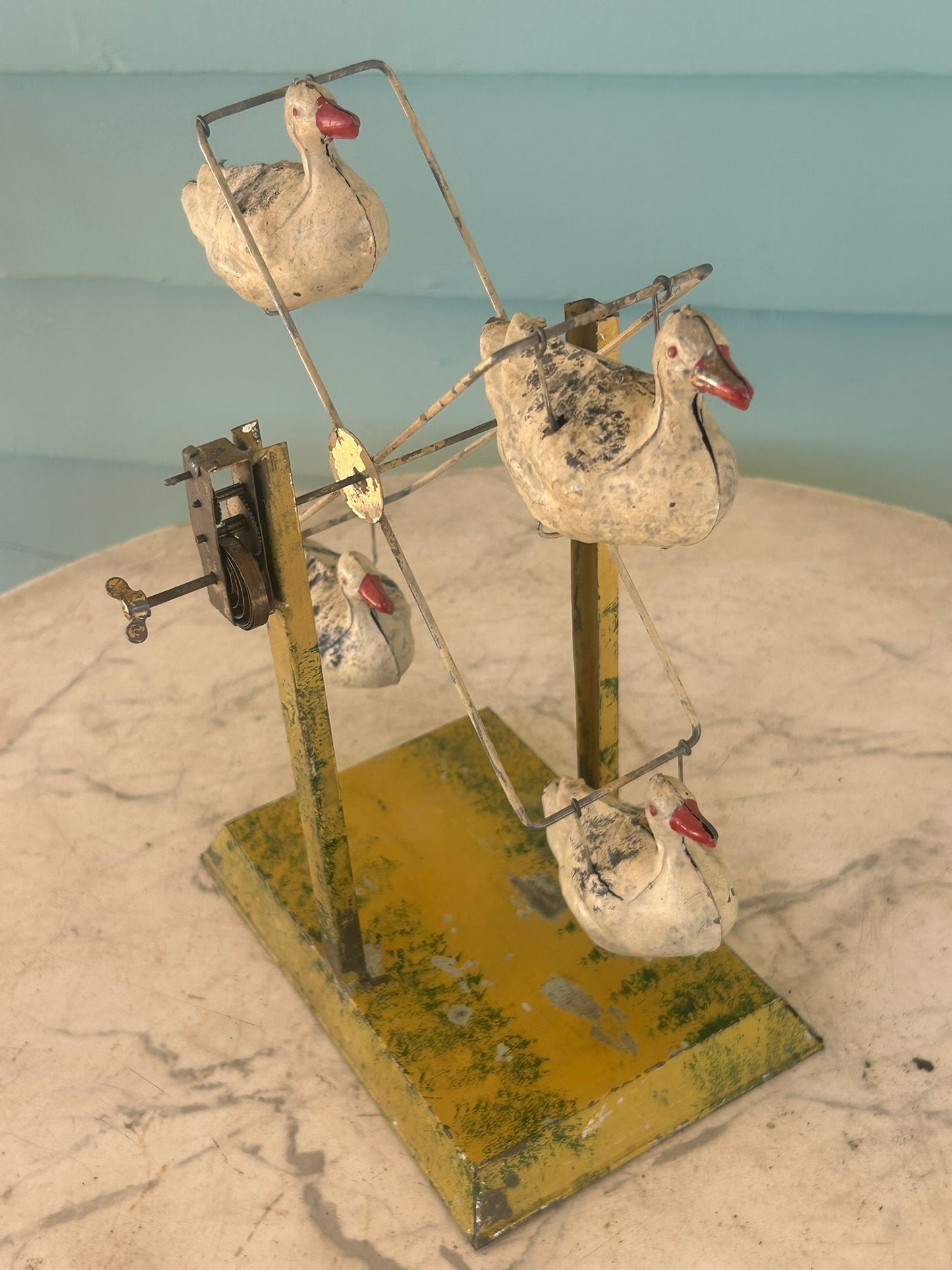 ANTIQUE REVOLVING DUCKS EARLY 1900'S TIN TOY WIND UP