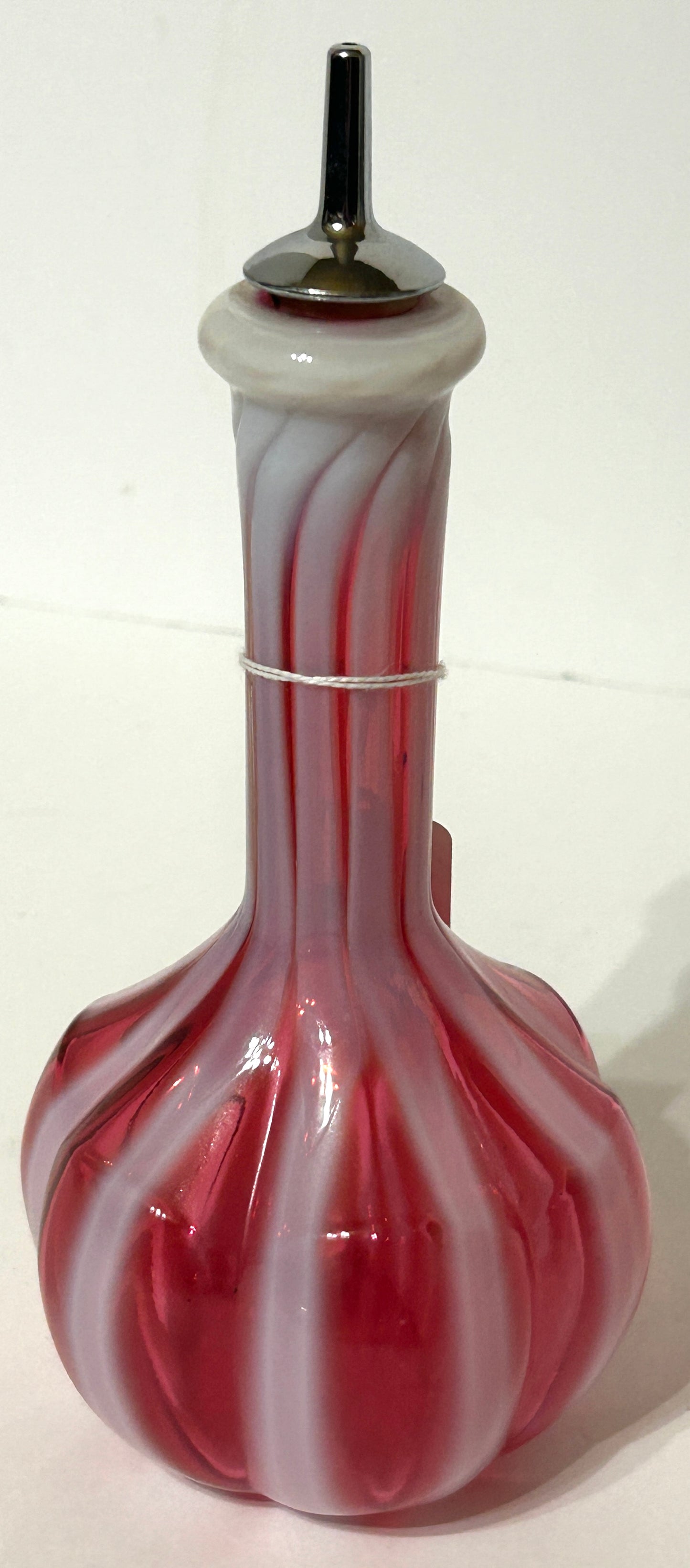 BARBER BOTTLE IN CRANBERRY OPAL STRIPE GLASS
