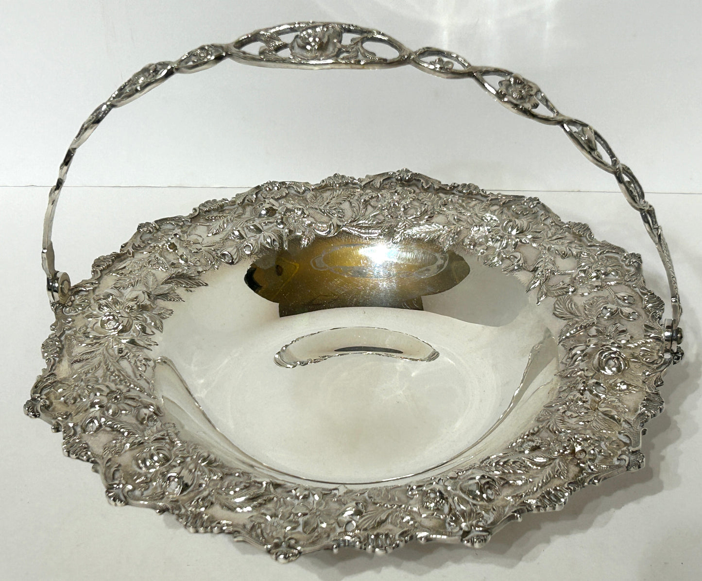 KIRK STERLING ANTIQUE BASKET IN FANCY FLORAL DESIGN