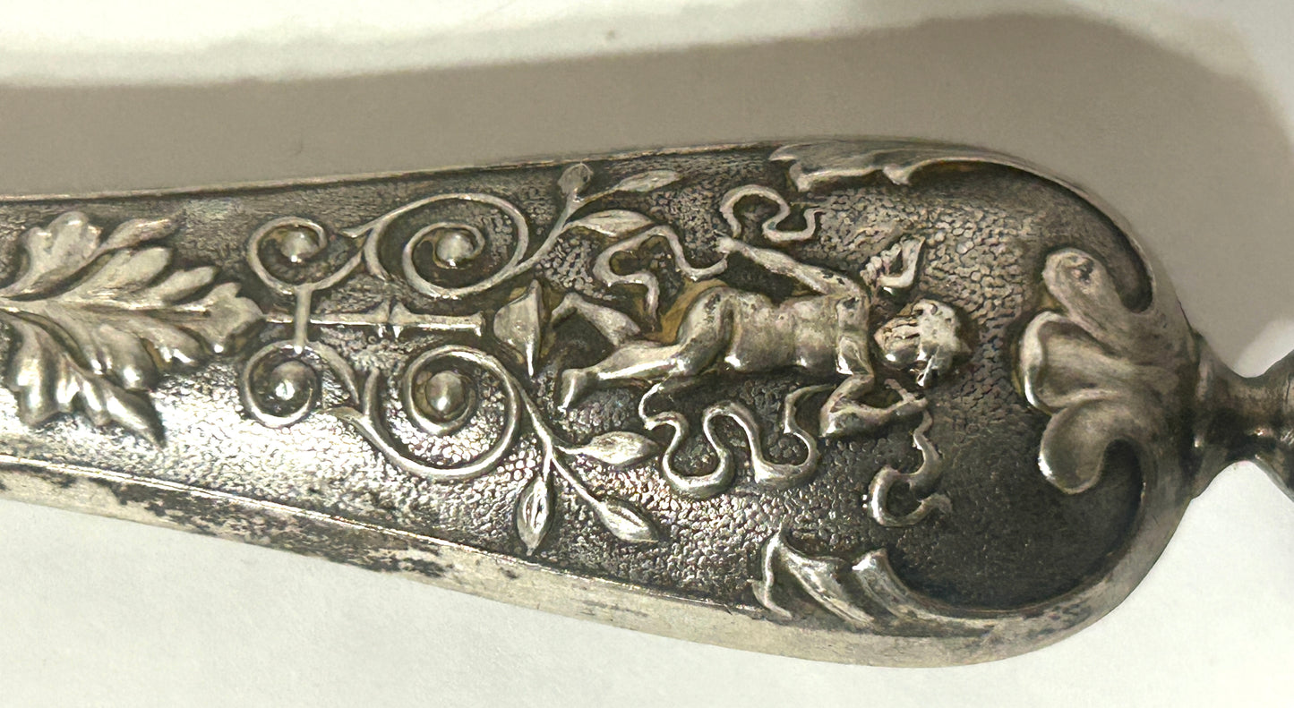 SILVER HANDLES WITH CHERUBS ANTIQUE SERVING FORK AND SPOON
