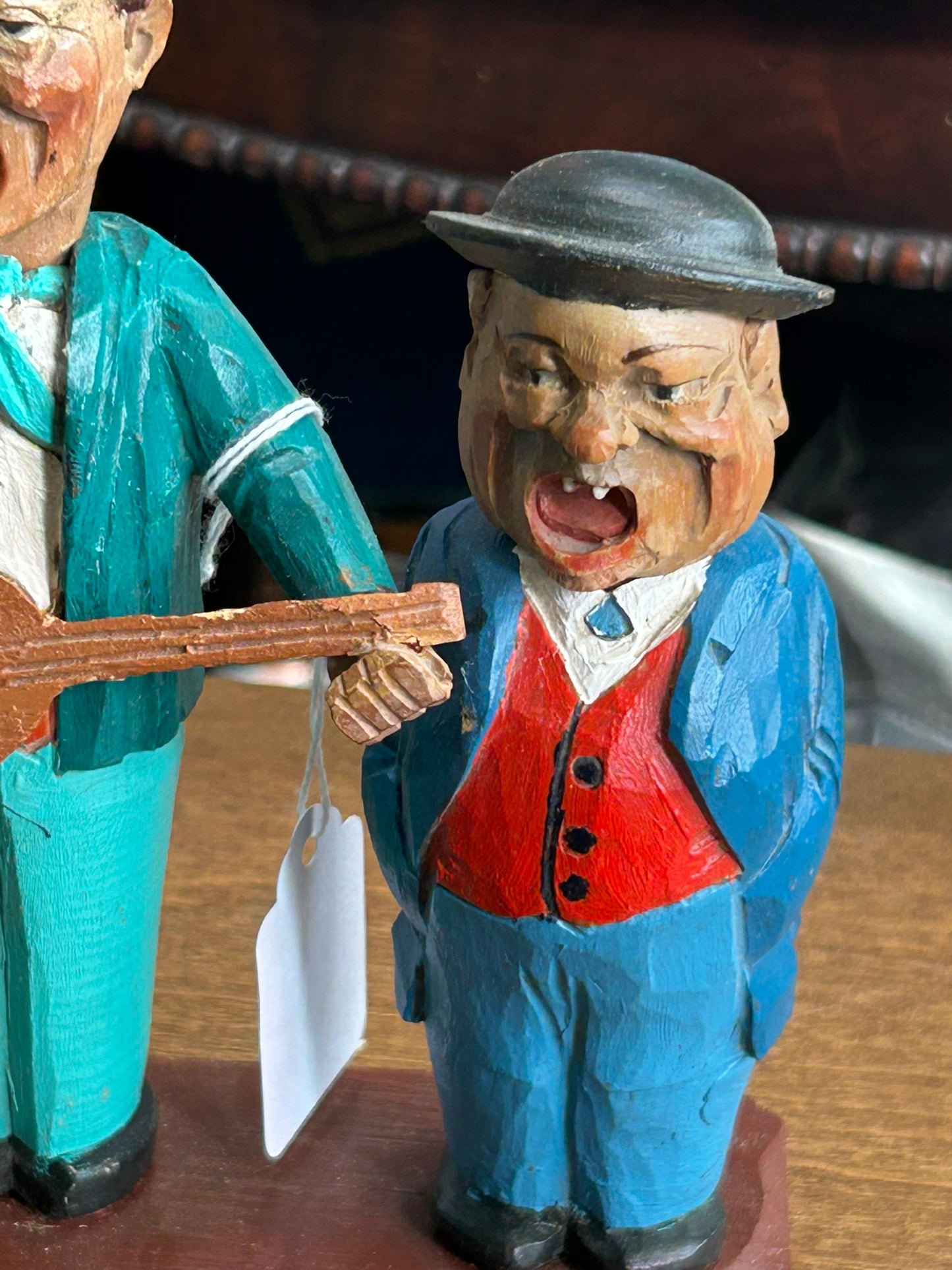 CARVED WOODEN FIGURES OF CORK SCREW, BOTTLE OPENER AND BOTTLE STOPPER