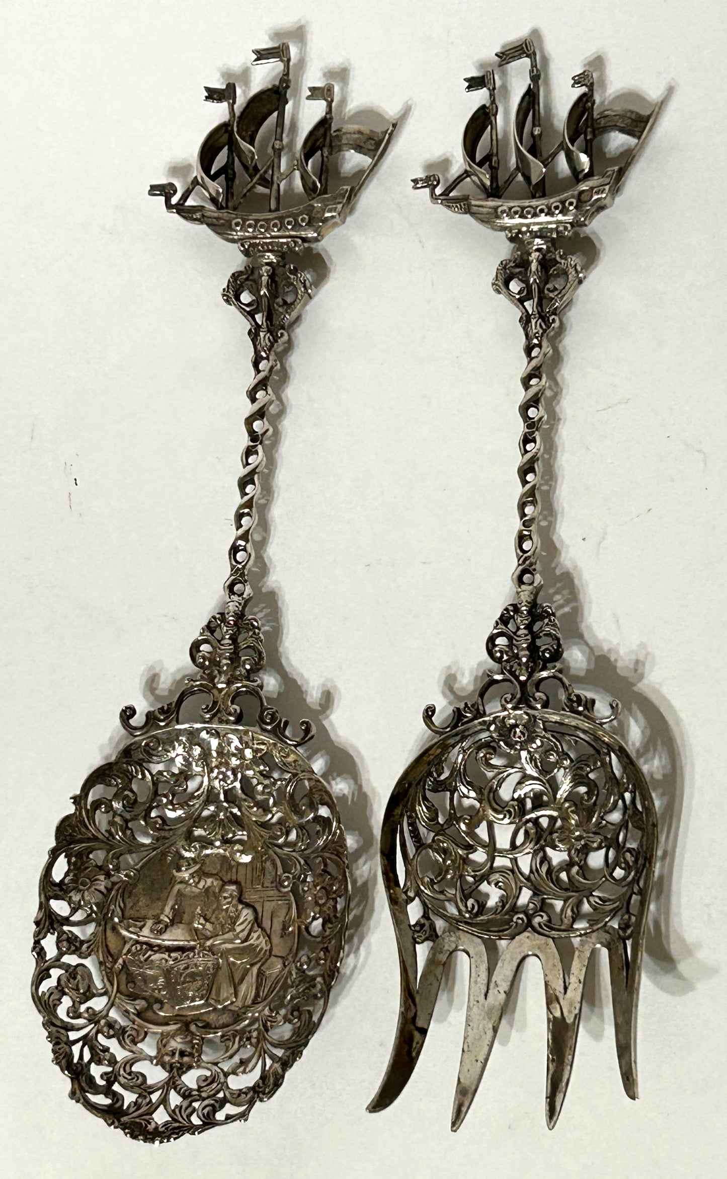 SILVER FANCY RETICULATED SERVING FORK AND SPOON WITH SHIP FINIALS