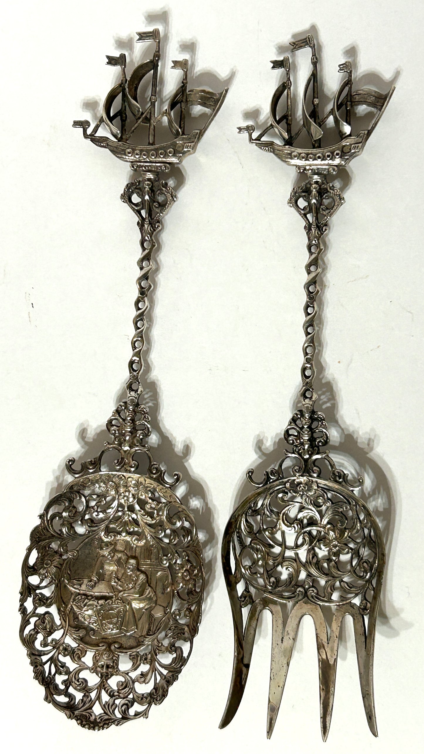 SILVER FANCY RETICULATED SERVING FORK AND SPOON WITH SHIP FINIALS