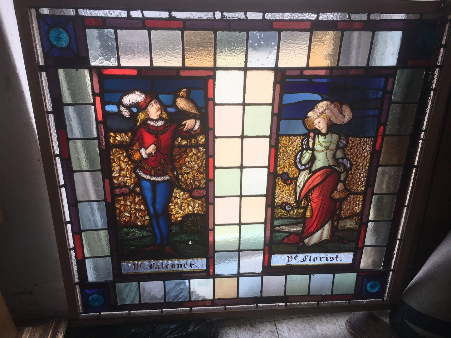 ANTIQUE FIGURAL STAINED GLASS WINDOW WITH FALCONER AND MAIDEN