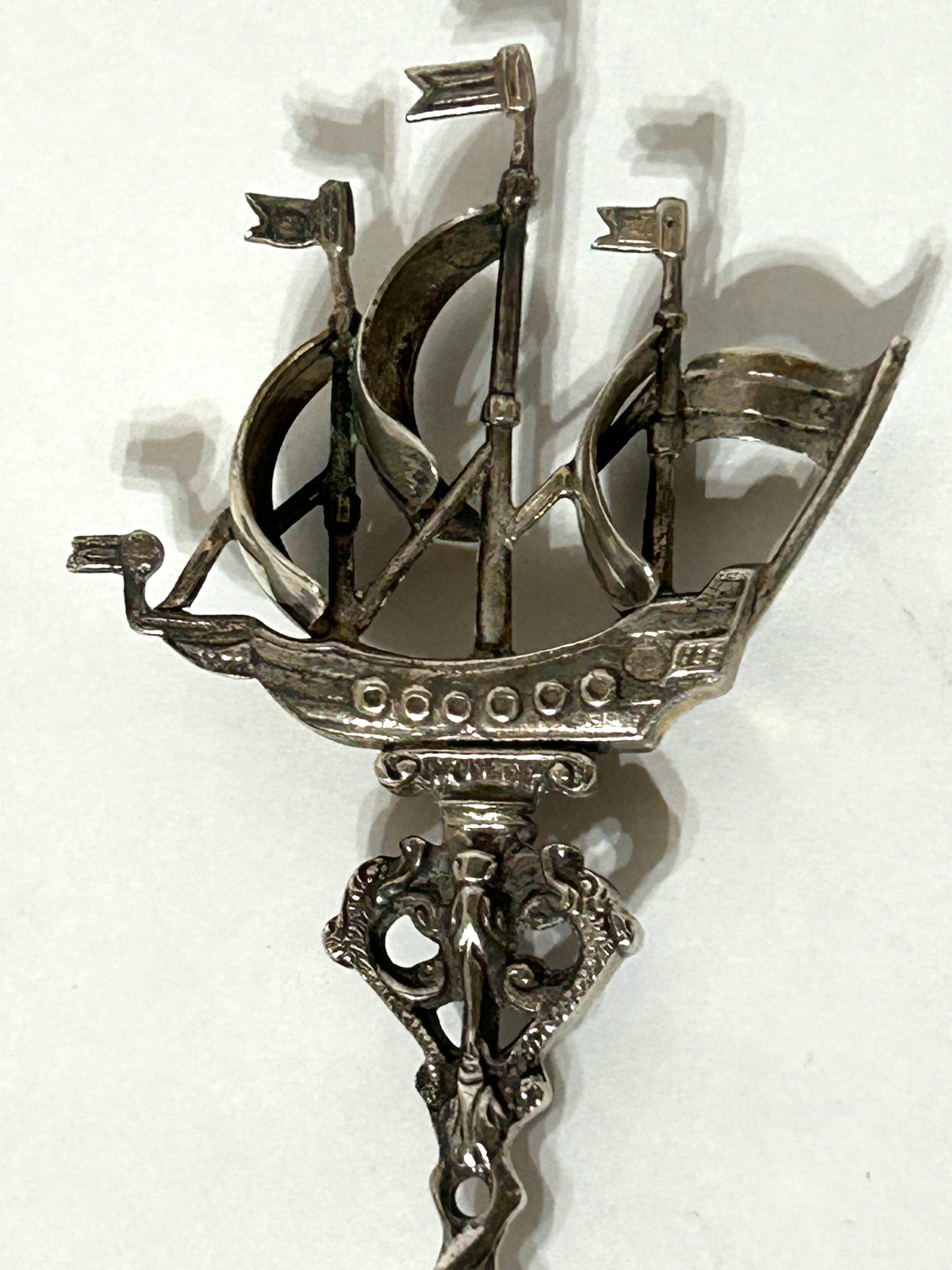 SILVER FANCY RETICULATED SERVING FORK AND SPOON WITH SHIP FINIALS