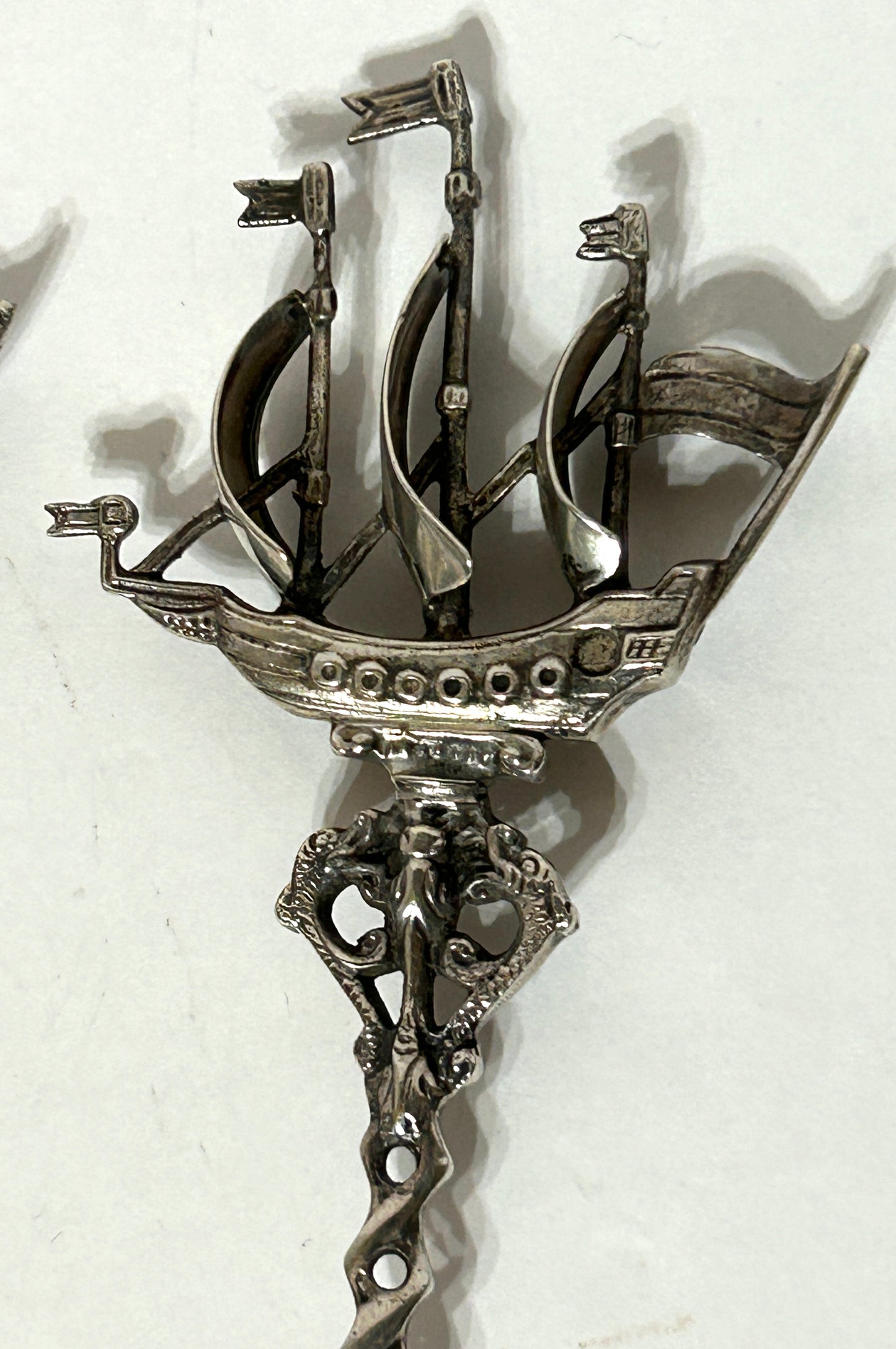 SILVER FANCY RETICULATED SERVING FORK AND SPOON WITH SHIP FINIALS