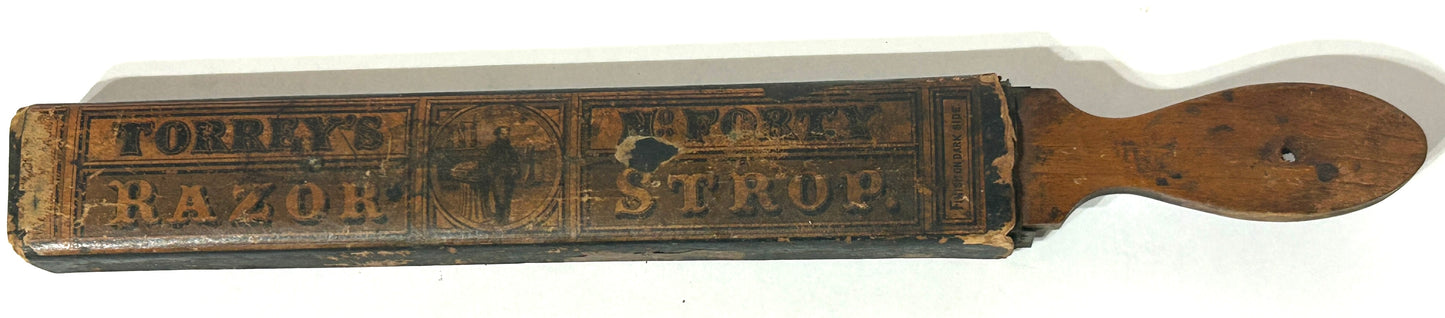 ANTIQUE RAZOR SHARPENER WITH GREAT LABEL