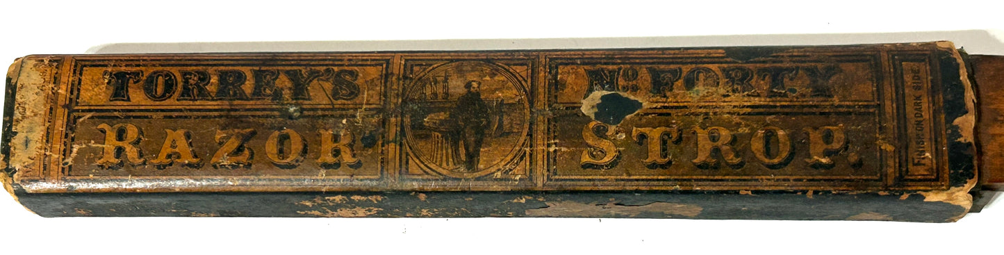 ANTIQUE RAZOR SHARPENER WITH GREAT LABEL