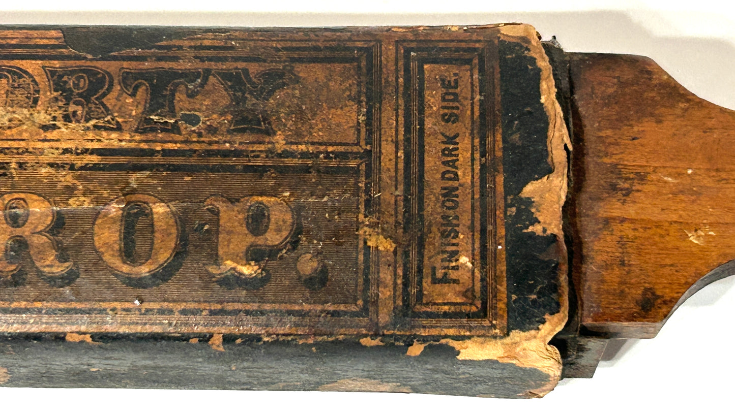 ANTIQUE RAZOR SHARPENER WITH GREAT LABEL