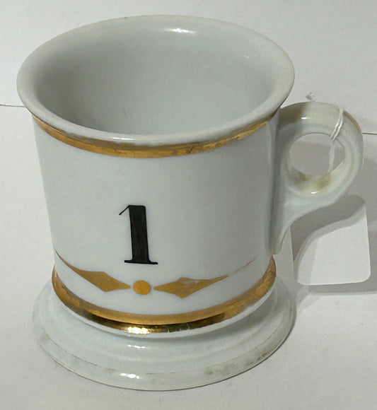 ANTIQUE SHAVING MUG WITH #1 PAINTED ON IT