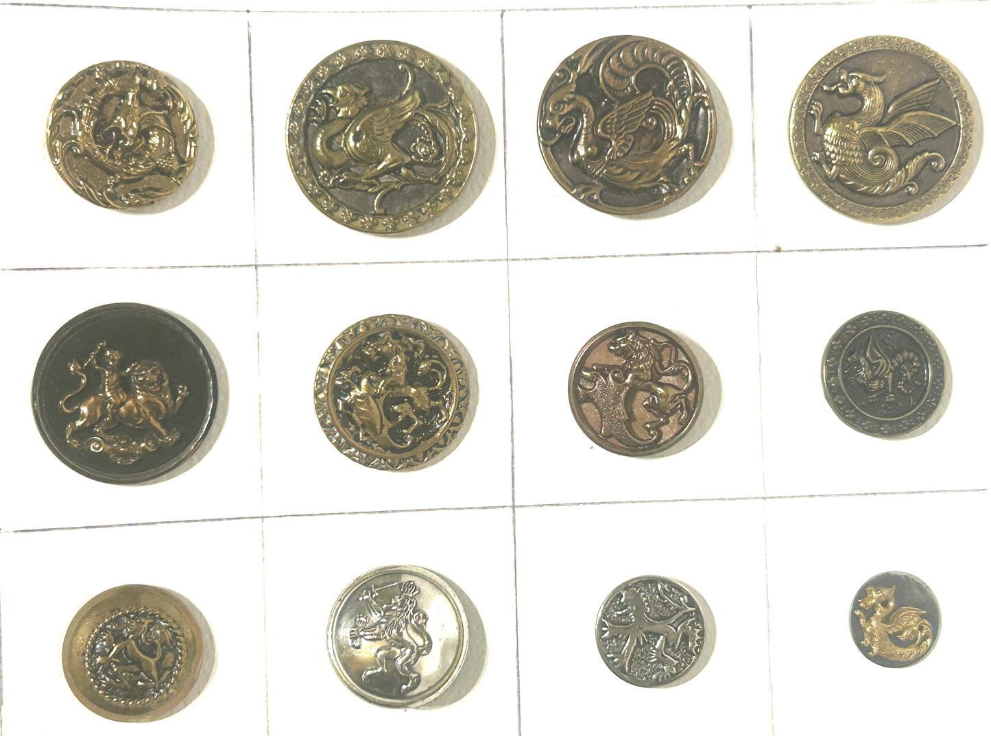 ANTIQUE BUTTONS WITH GRIFFINS AND DRAGONS
