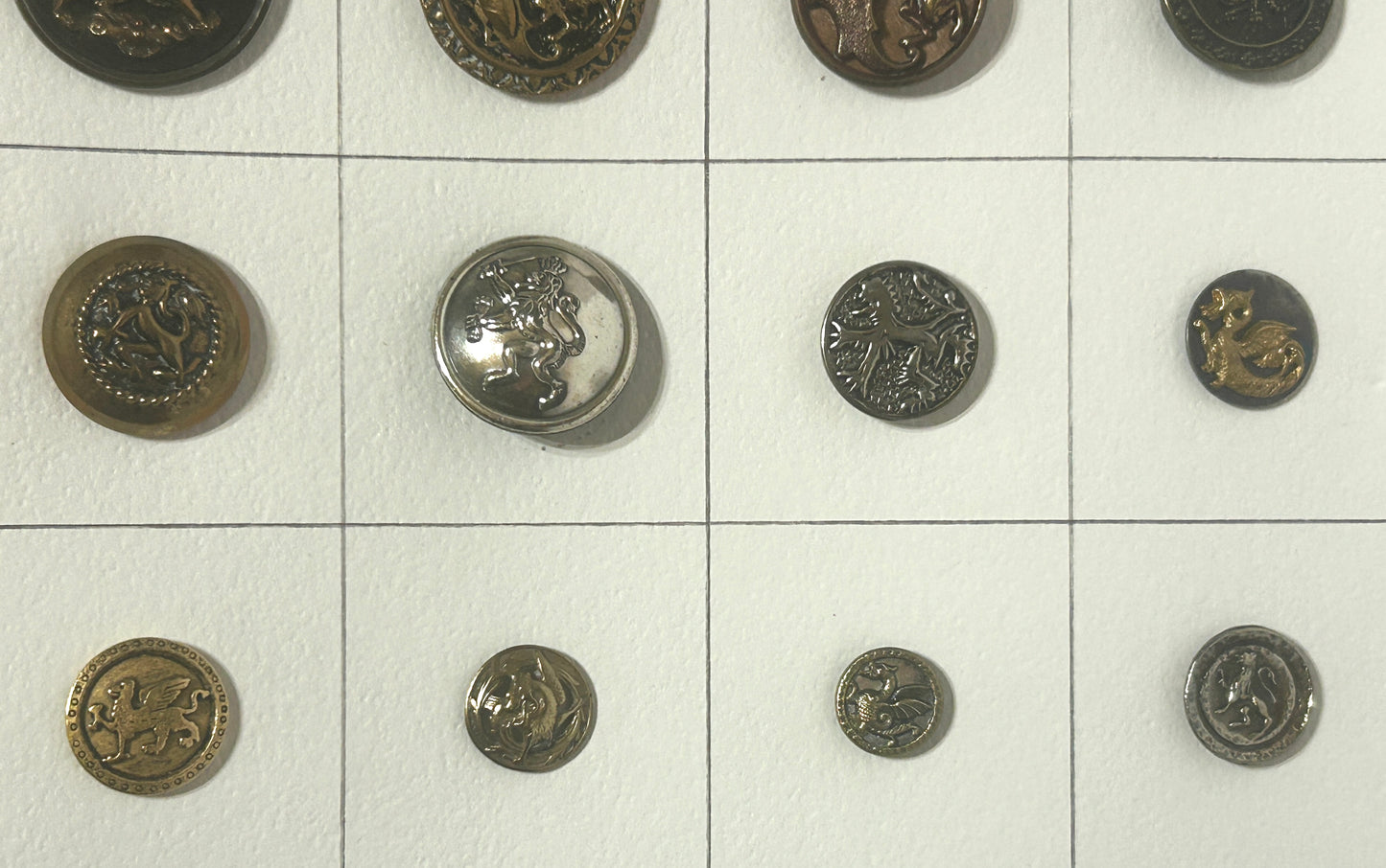 ANTIQUE BUTTONS WITH GRIFFINS AND DRAGONS