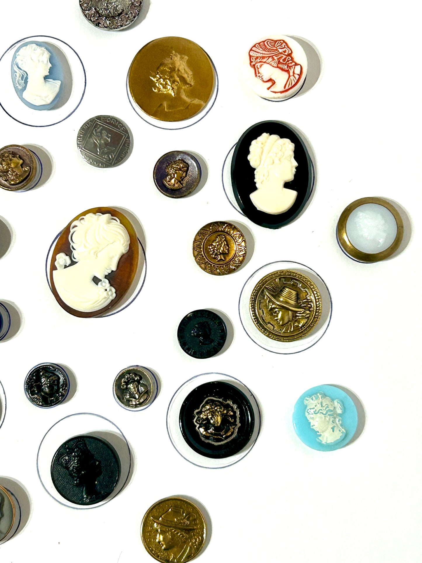 ANTIQUE BUTTONS WITH WOMAN HEADS