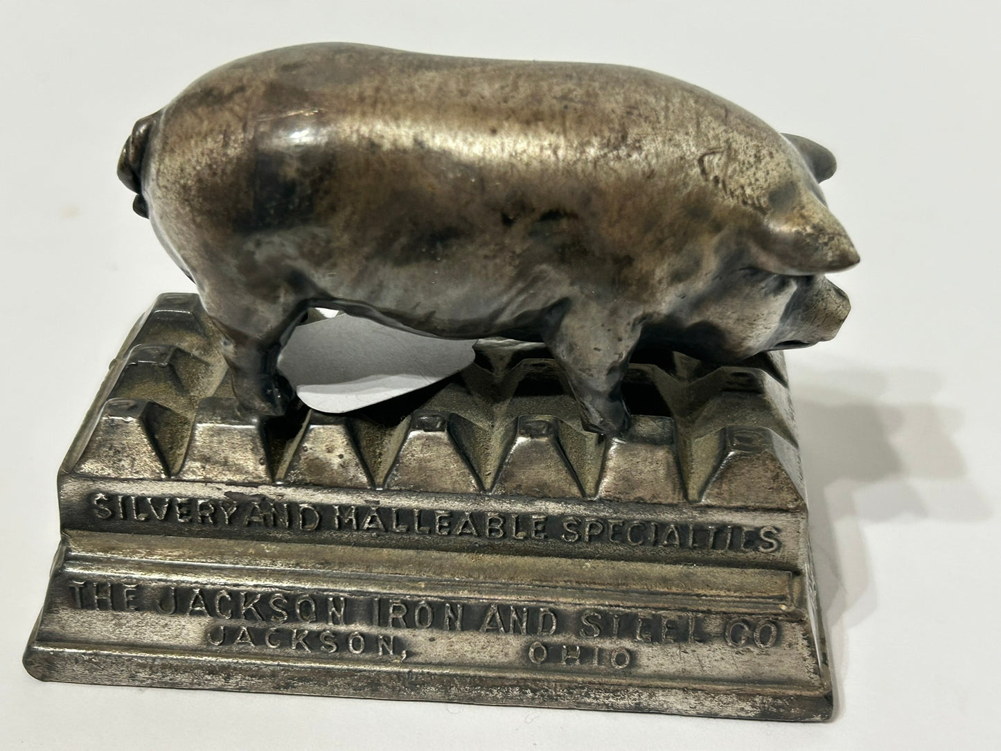 FIGURAL PIG CAST IRON ADVERTISING PAPERWEIGHT FOR JACKSON IRON AND STEEL