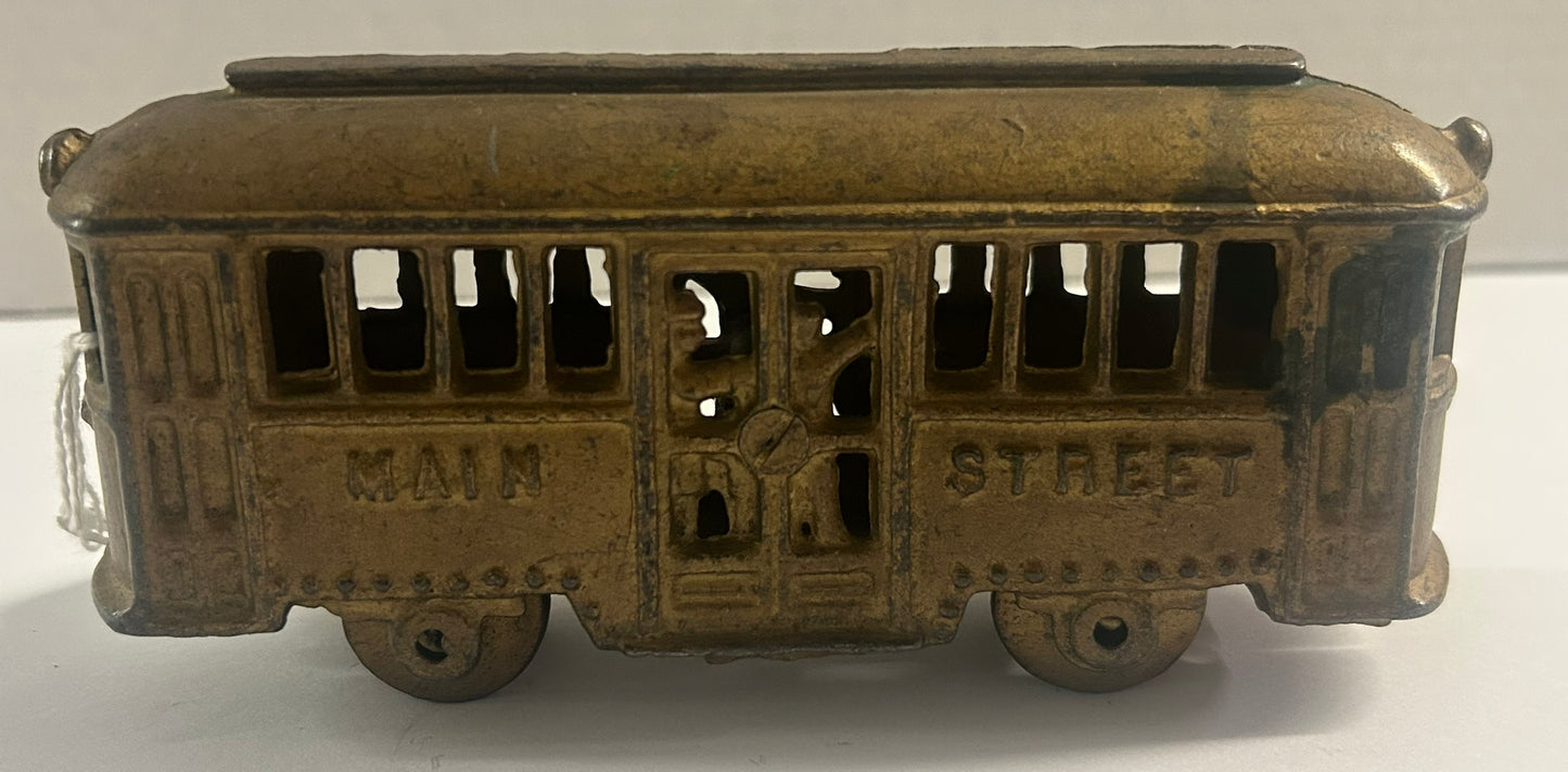 CAST IRON MAIN STREET TROLLY ANTIQUE BANK
