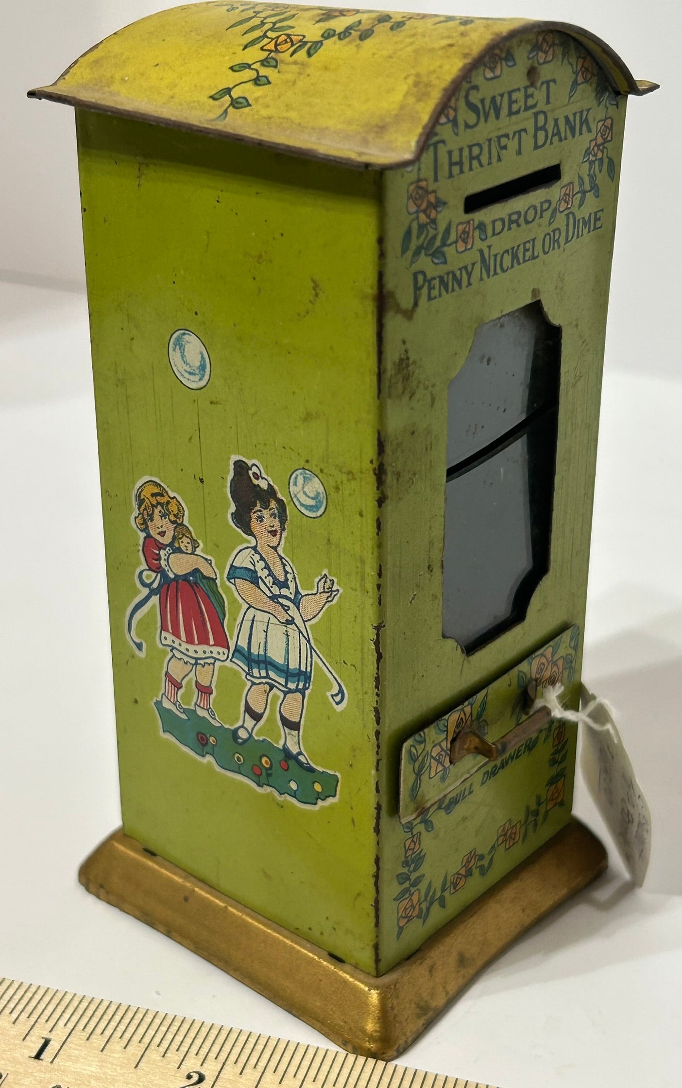 ANTIQUE SWEET THRIFT TIN BANK