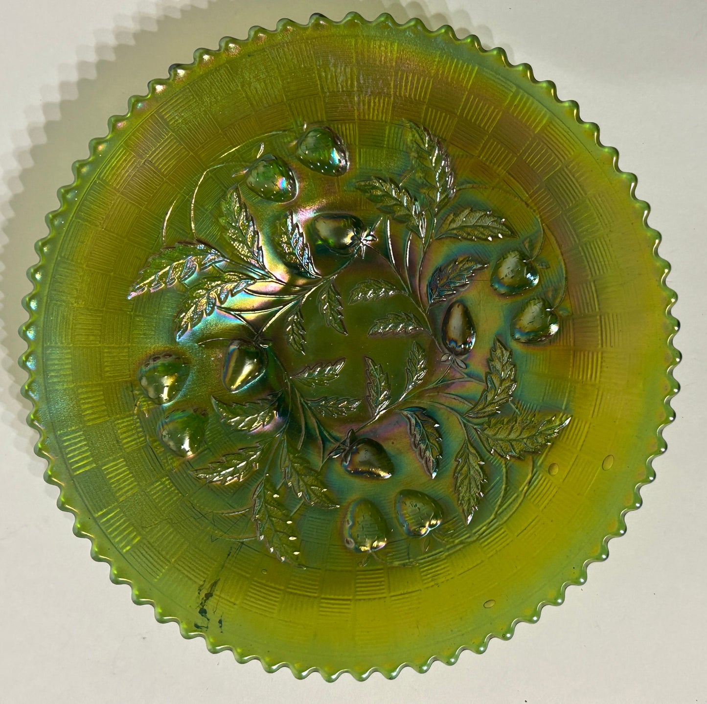 CARNIVAL GLASS GREEN STRAWBERRY AND BASKETWEAVE PLATE