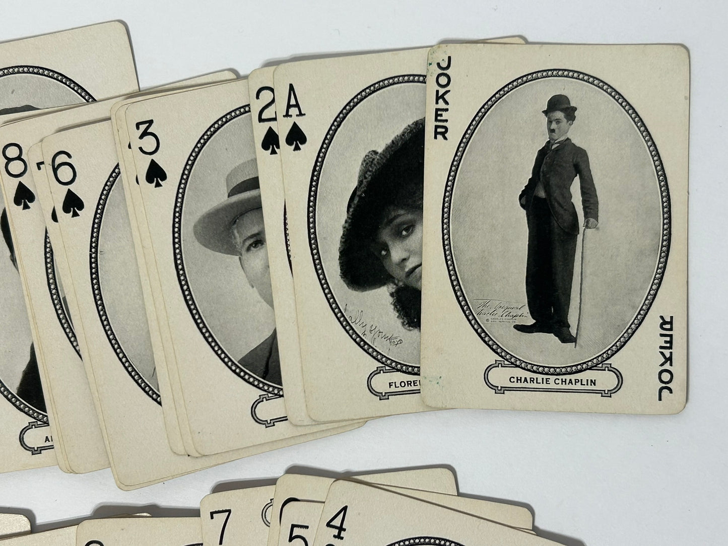 ANTIQUE PLAYING CARDS WITH SILENT MOVIE STARS INCLUDING CHARLIE CHAPLIN