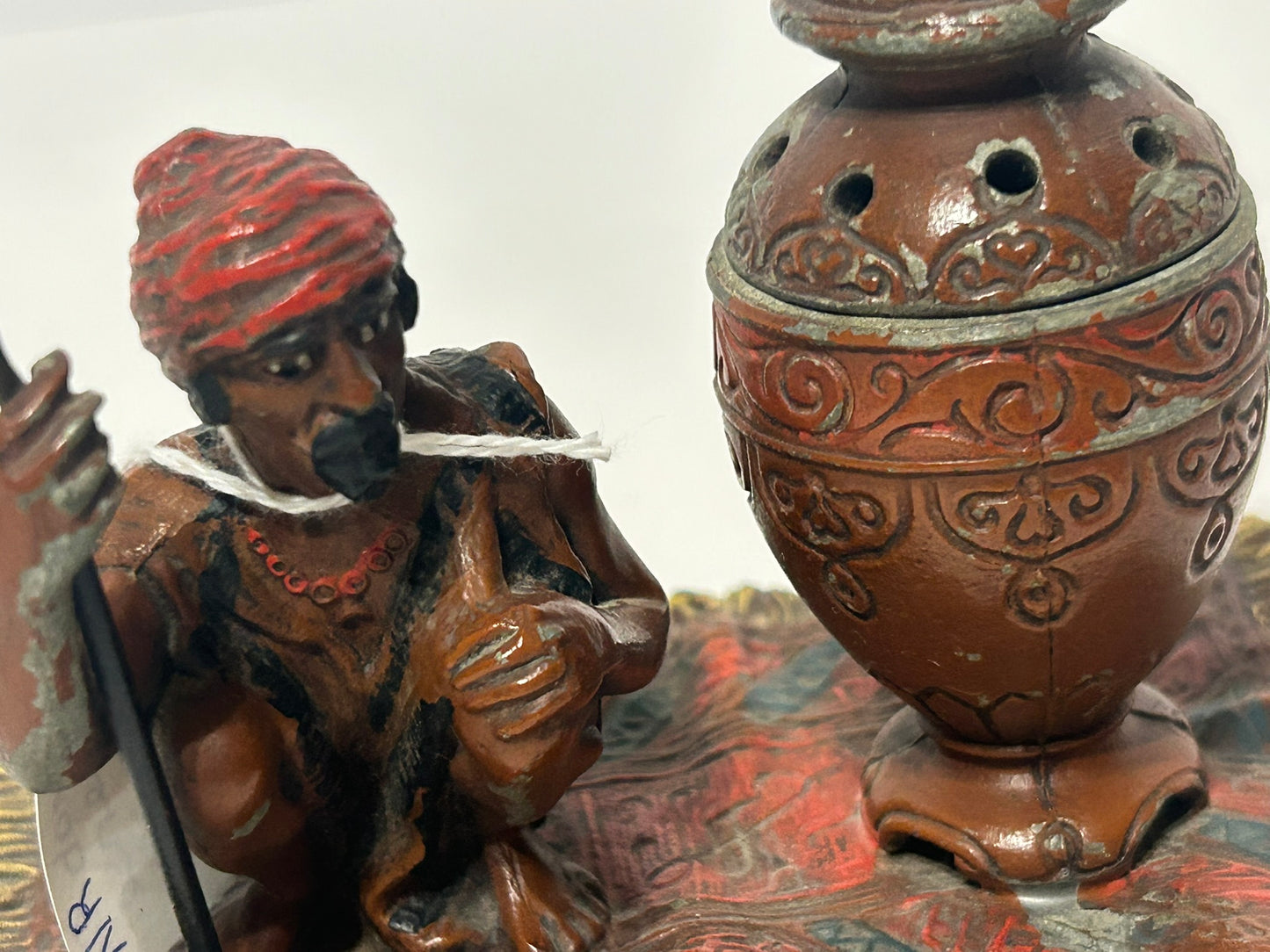 ARAB ON RUG METAL INCENSE BURNER