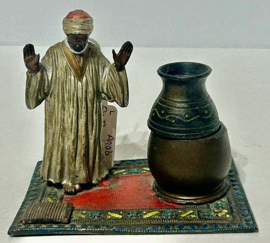 FIGURAL METAL INCENSE BURNER OF ARAB ON RUG