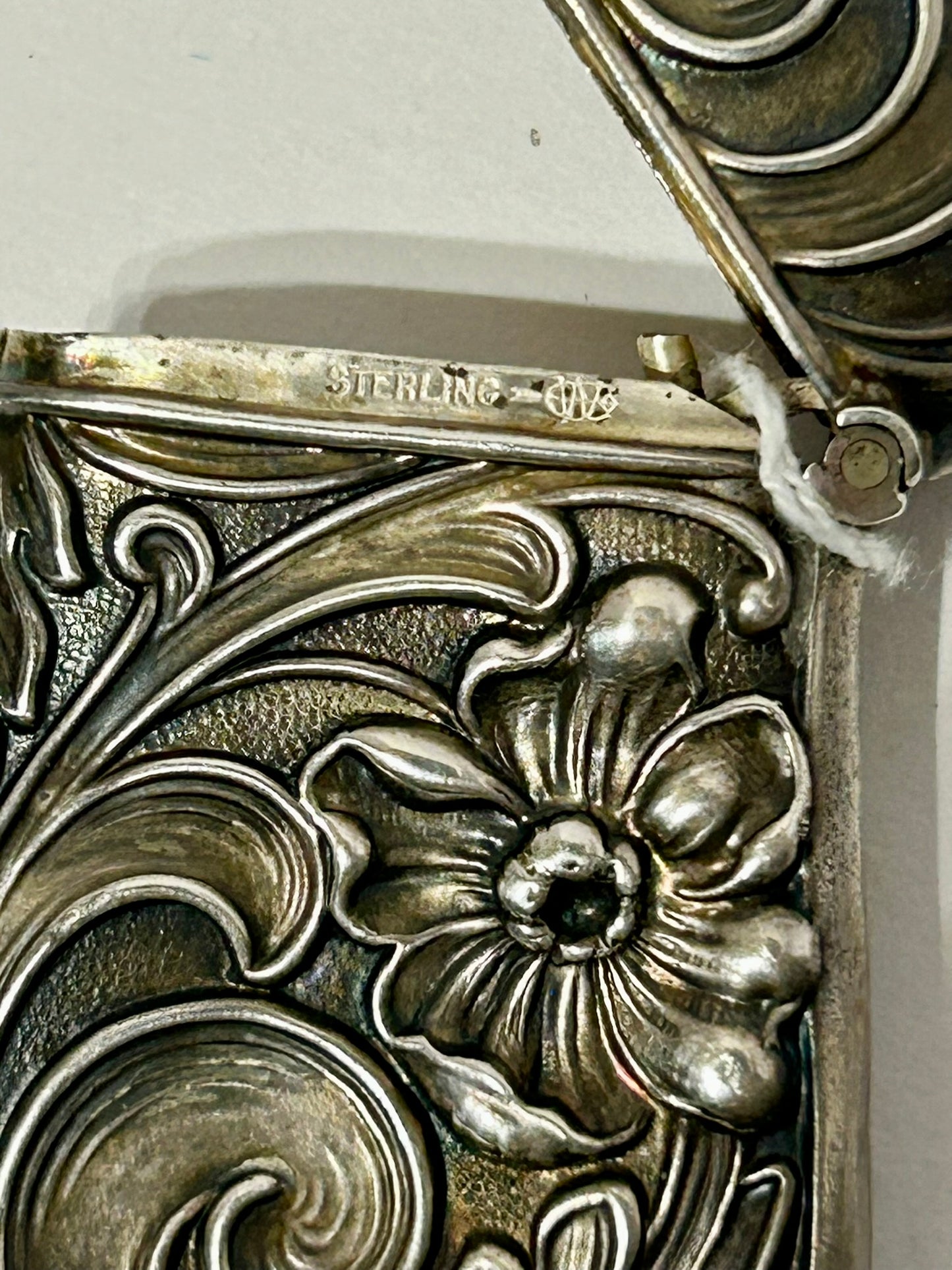 ANTIQUE MATCH SAFE WITH FANCY STERLING DESIGN