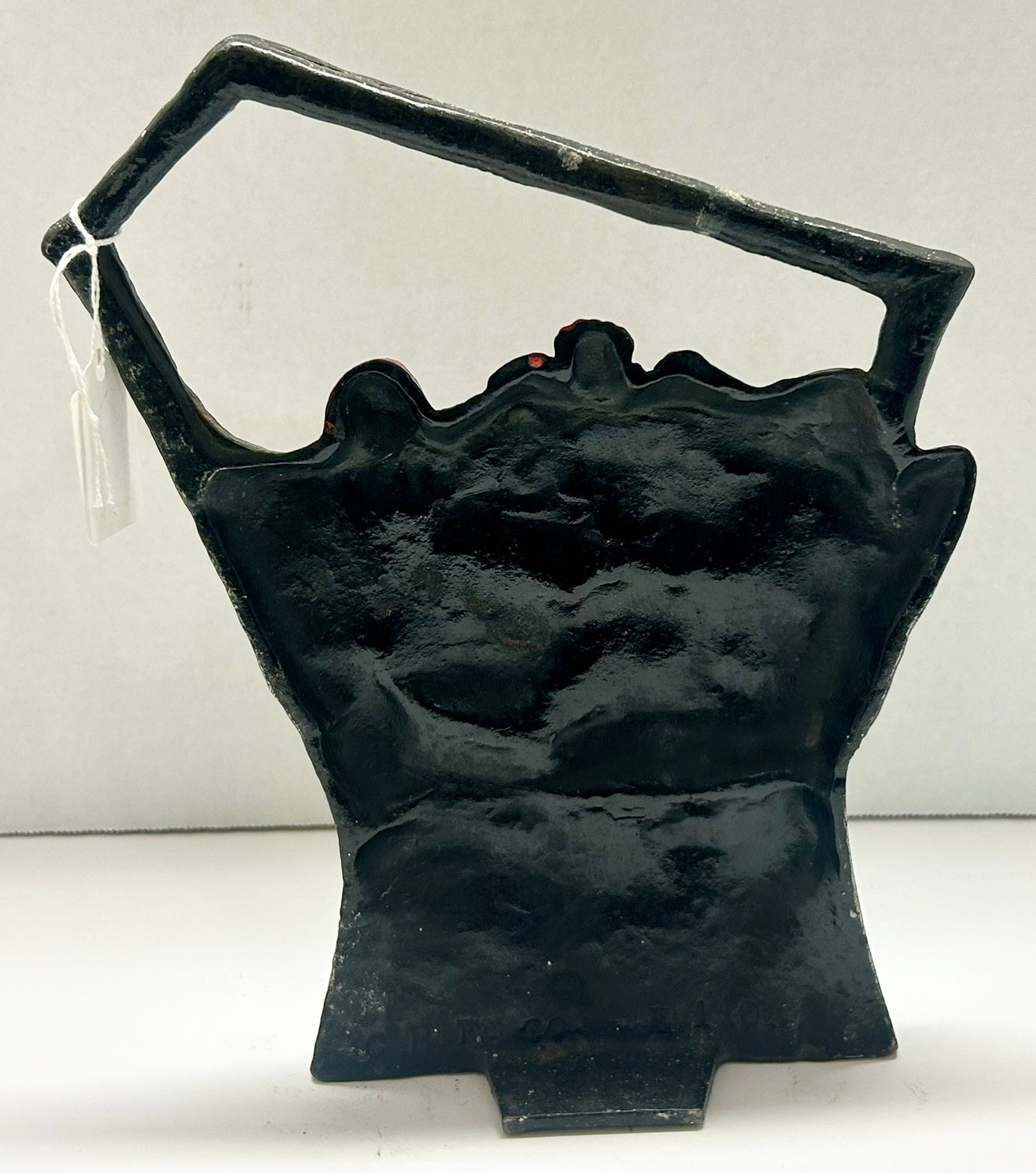 POPPIES IN SLANT HANDLE BASKET IRON DOORSTOP