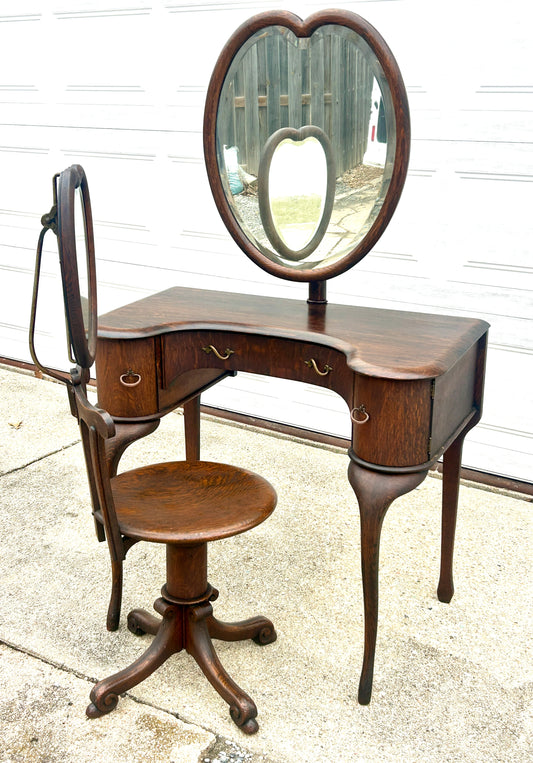ANTIQUE OAK VANITY AND CHAIR WITH RARE ADJUSTIBLE HEART SHAPE MIRRORS PAT. 1904