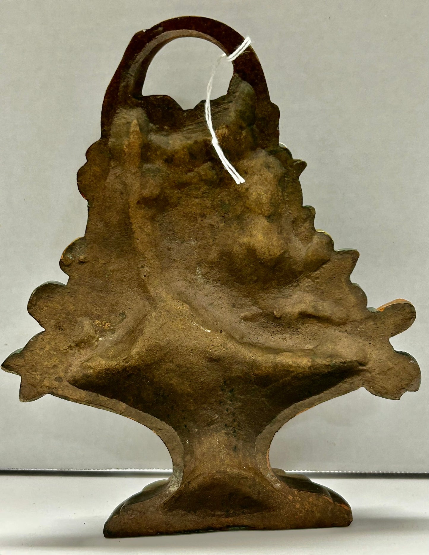 CAST IRON DOORSTOP OF MIXED FLOWERS IN BASKET
