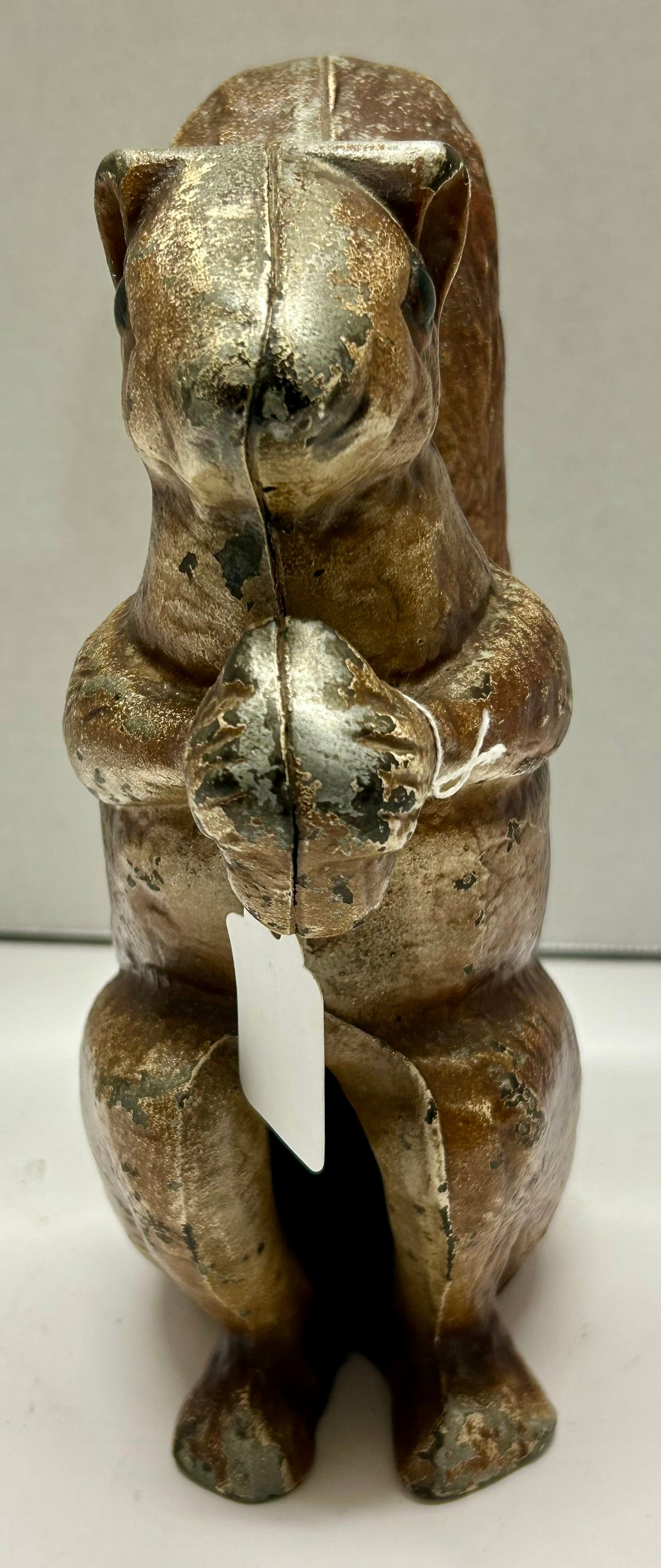 ANTIQUE CAST IRON SQUIRREL HOLDING NUT DOOR STOP